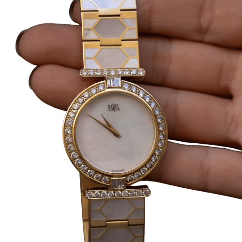 Montre Ravel - Montre-bijou vintage en or jaune, nacre et diamants, années 1980 58 Facettes
