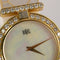Montre Ravel - Montre-bijou vintage en or jaune, nacre et diamants, années 1980 58 Facettes