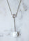 Collier Chanel - Collier Camélia en or blanc, diamants et agate blanche 58 Facettes