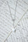 Collier Chanel - Collier Camélia en or blanc, diamants et agate blanche 58 Facettes