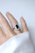 Bague 54 Bague Art déco en platine, saphir ovale et entourage de diamants 58 Facettes