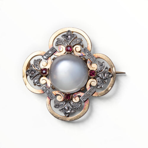 Broche Broche en or jaune 18K, pierre de lune, diamants et rubis 58 Facettes