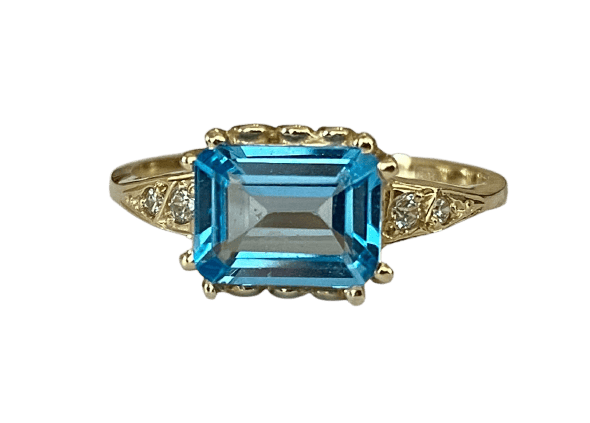 Bague 53 Bague en or jaune 14 carats, topaze bleue et diamants 58 Facettes ring