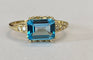 Bague 53 Bague en or jaune 14 carats, topaze bleue et diamants 58 Facettes ring