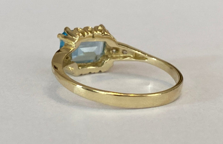 Bague 53 Bague en or jaune 14 carats, topaze bleue et diamants 58 Facettes ring