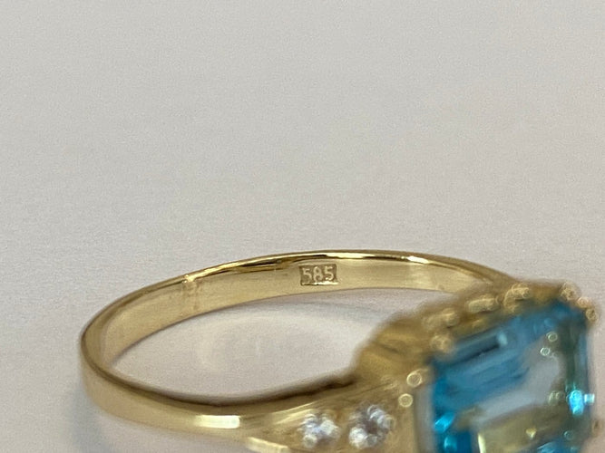 Bague 53 Bague en or jaune 14 carats, topaze bleue et diamants 58 Facettes ring
