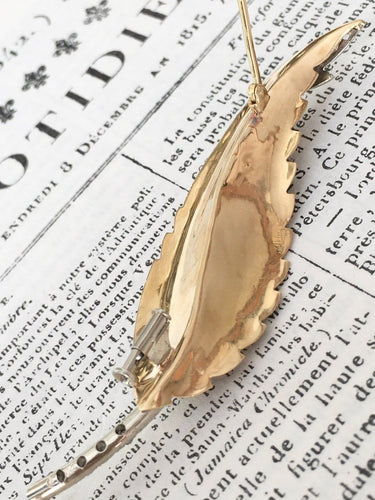 Broche Broche plume en or jaune et blanc 18k avec diamants taille rose 58 Facettes 307