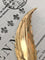 Broche Broche plume en or jaune et blanc 18k avec diamants taille rose 58 Facettes 307