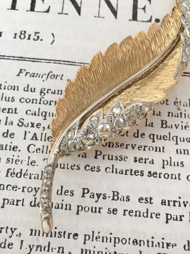Broche Broche plume en or jaune et blanc 18k avec diamants taille rose 58 Facettes 307