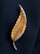 Broche Broche plume en or jaune et blanc 18k avec diamants taille rose 58 Facettes 307