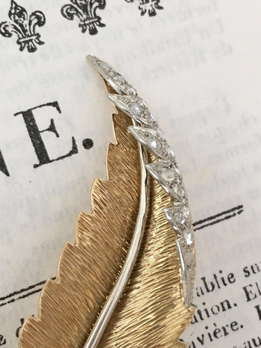 Broche Broche plume en or jaune et blanc 18k avec diamants taille rose 58 Facettes 307