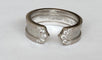 Bague 50 Cartier - Bague C vintage en or blanc 18k avec diamants 58 Facettes ring