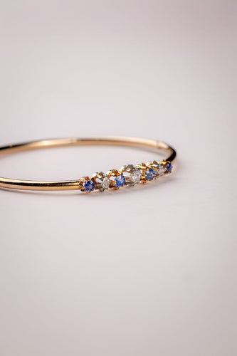 Bracelet Bracelet jonc Belle Époque en or jaune 18 carats et platine, diamants et saphirs 58 Facettes A-015