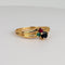 Bague 52 Bague en or jaune 18k, rubis, émeraude et saphir bleu 58 Facettes 2609006