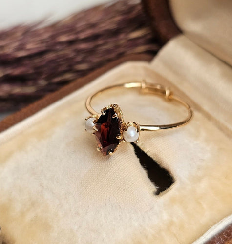 Bague 51.5 Bague trilogie en or rose 18 carats, grenat et perles de culture 58 Facettes 772