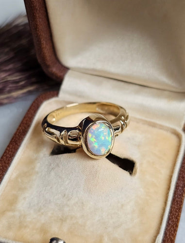 Bague 55 Bague jonc en or jaune 14 carats avec opale de synthèse 58 Facettes 689