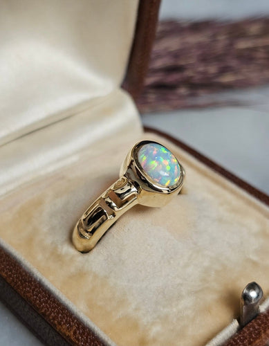 Bague 55 Bague jonc en or jaune 14 carats avec opale de synthèse 58 Facettes 689