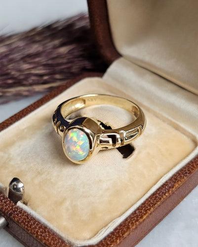 Bague 55 Bague jonc en or jaune 14 carats avec opale de synthèse 58 Facettes 689
