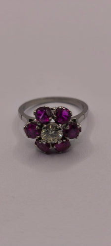 Bague 54 Bague en platine 950 avec diamant central et marguerite de six rubis 58 Facettes Valuor Modèle-015