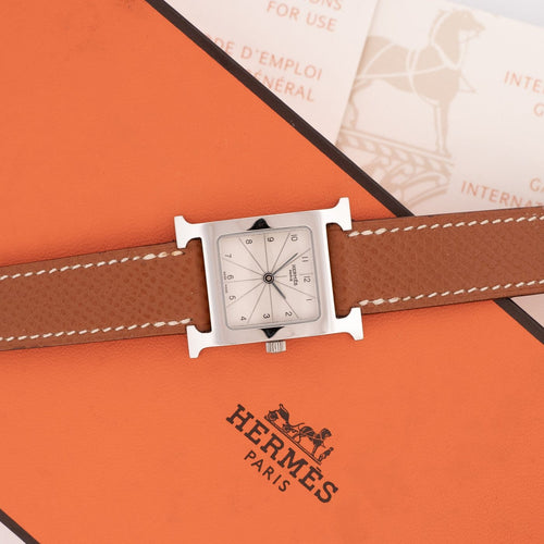 Montre Hermès - Montre Heure H, cadran argenté à chiffres arabes, SM 58 Facettes 603