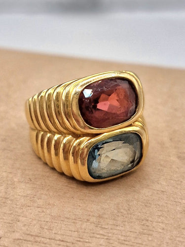 Bague 55 Bulgari - Bague Doppio en or jaune 750, topaze bleue et tourmaline 58 Facettes CV-140