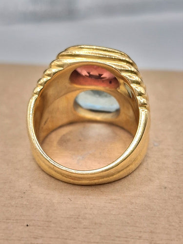 Bague 55 Bulgari - Bague Doppio en or jaune 750, topaze bleue et tourmaline 58 Facettes CV-140