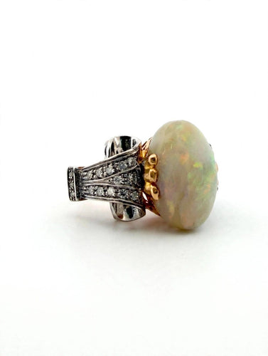 Bague 58 Bague en or jaune et blanc 18k, opale et diamants 58 Facettes 605/26 G