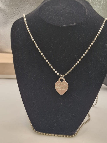 Pendentif Tiffany & Co. - Pendentif Return to Chain and Heart en argent 925 58 Facettes CV-147