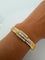 Bracelet Bracelet rigide en or jaune 18k avec diamants 58 Facettes 605/26 D