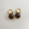 Boucles d'oreilles Jullie - Boucles d’oreilles boules en quartz fumé 58 Facettes SER1038YG_20261014