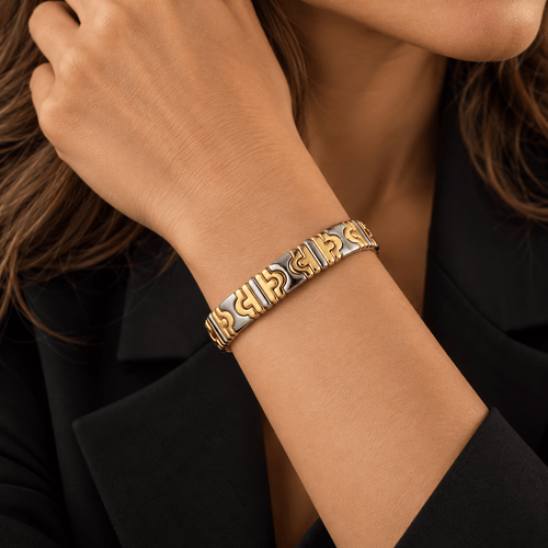 Bracelet Bulgari - Bracelet jonc ouvert Parentesi en or jaune 18k et acier inoxydable 58 Facettes