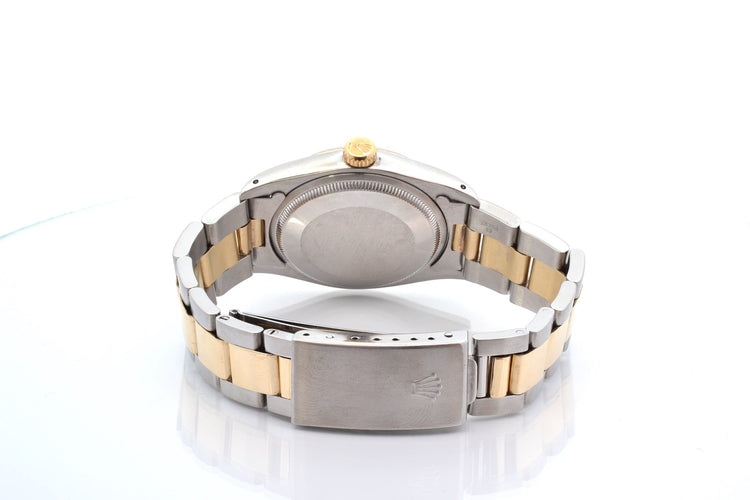 Montre Rolex Oyster Perpetual Date - Montre automatique 34 mm or et acier 58 Facettes 27486