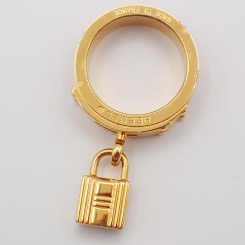 Hermès - Kelly Gavroche en métal plaqué or et cuir 58 Facettes ldansx3lvp