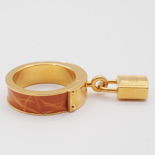 Hermès - Kelly Gavroche en métal plaqué or et cuir 58 Facettes ldansx3lvp
