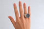 Bague 52.5 Bague chevalière bombée en or gris 18k, diamants noirs et saphirs jaunes 58 Facettes LP1957/MLNNB
