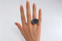 Bague 52.5 Bague chevalière bombée en or gris 18k, diamants noirs et saphirs jaunes 58 Facettes LP1957/MLNNB