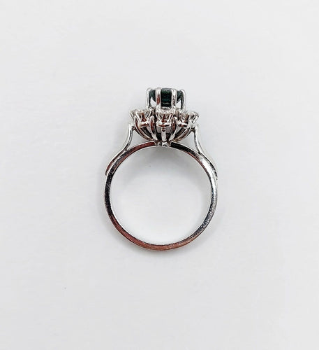 Bague 45 Bague marguerite vintage en or blanc 18k, saphir et diamants 58 Facettes A08033
