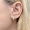 Boucles d'oreilles Wempe - Boucles d’oreilles créoles bombées en or rose 750/000 et diamants 58 Facettes 36044