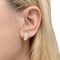 Boucles d'oreilles Wempe - Boucles d’oreilles créoles bombées en or rose 750/000 et diamants 58 Facettes 36044