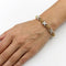 Bracelet Bracelet manchette vintage en or jaune 14 carats, diamants et détails en or blanc 58 Facettes 11243