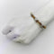 Bracelet Bracelet manchette vintage en or jaune 14 carats, diamants et détails en or blanc 58 Facettes 11243