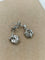 Boucles d'oreilles Boucles d’oreilles pendantes fleur en or blanc 18k et diamants 58 Facettes CV-148