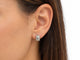 Boucles d'oreilles Poiray - Boucles d’oreilles vintage en or blanc 18 carats, monogramme ajouré 58 Facettes 33876