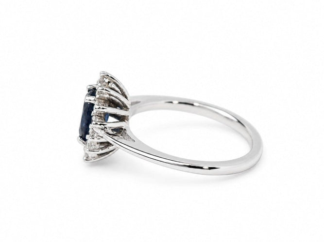 Bague 50 Bague Marguerite - Saphir bleu 1 ct, diamants et or blanc 18 carats 58 Facettes 33885