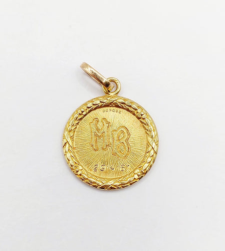Pendentif Augis - Pendentif médaille d’amour 23 mm en or 18k, diamant et rubis 58 Facettes A07925