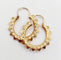 Boucles d'oreilles Créoles vintage en or rose 18k à motifs géométriques ciselés 58 Facettes A07942
