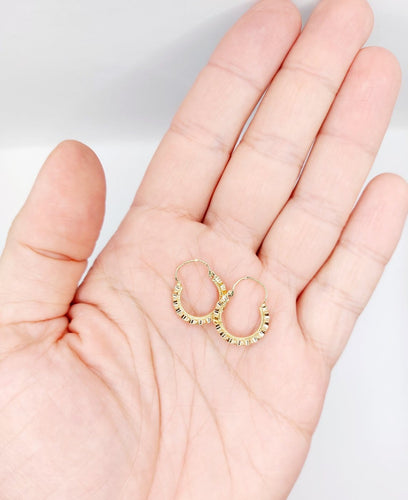 Boucles d'oreilles Créoles vintage en or rose 18k à motifs géométriques 58 Facettes A07944