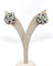 Boucles d'oreilles Boucles d’oreilles clip vintage en platine, diamants, saphirs et émeraudes 58 Facettes 89744