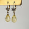 Boucles d'oreilles Boucles d’oreilles pendantes en or jaune 14k, quartz citron et diamants 58 Facettes