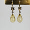 Boucles d'oreilles Boucles d’oreilles pendantes en or jaune 14k, quartz citron et diamants 58 Facettes